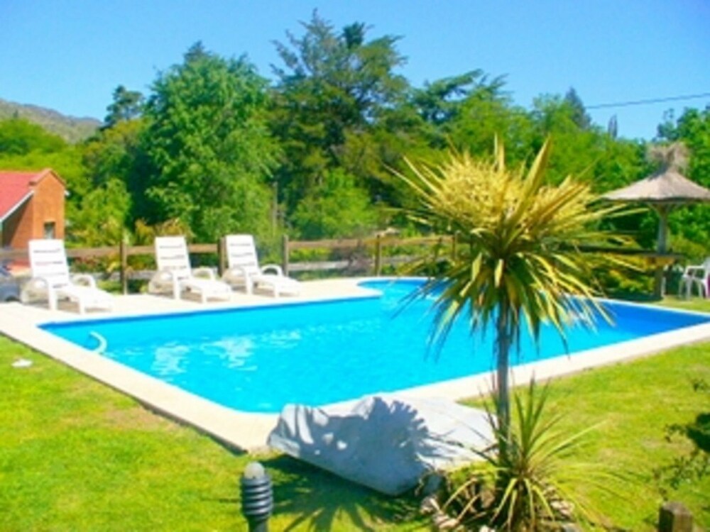 Chalet Los Abedules — 4-Star Luxury Hotel in Villa General Belgrano, Argentina