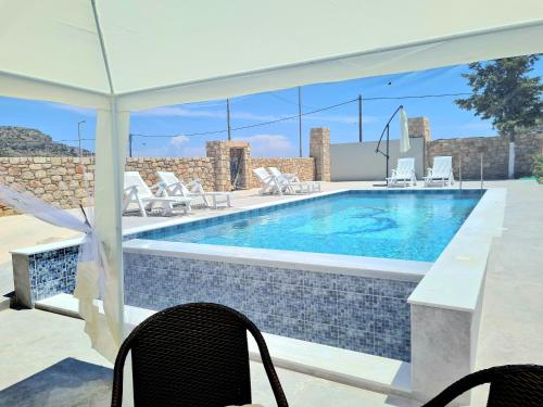 Traounou Serenity Villa — 4-Star Luxury Hotel in Afantou, Greece