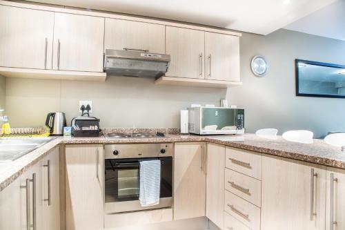 Modern 2 bedroom with underground parking 1 mins from beach 205 La Cabina Blouberg Cape Town