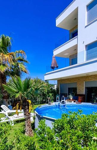 Luxury Apartment Slavica by the sea with garden — 4-Star Luxury Hotel in Sukosan, Croatia