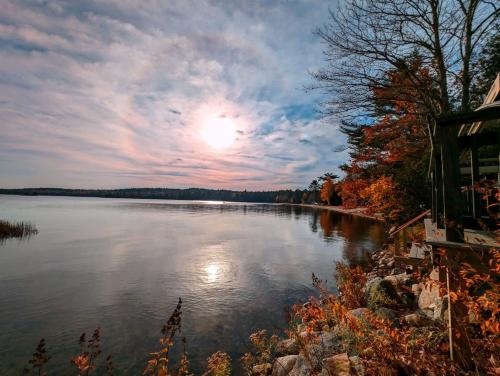 Back of the Moon Lakefront Camp family watersports fire pit 1 dog beach sleeps 8 — 4-Star Luxury Hotel in Sullivan, United States