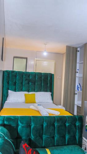 Cosy & Stylish studio apartment near JKIA SGR with high speed WiFi NETFLIX free parking and secure.