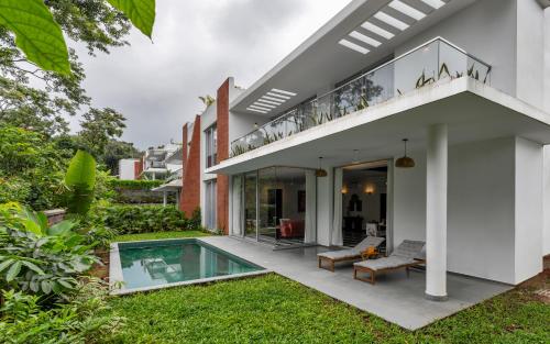La Masseria 3 BHK Premium villas with Private Pool close to Morjim Beach Garden Terrace Security Kitchen & Wifi in a Peaceful location — 5-Star Luxury Hotel in Solim, India