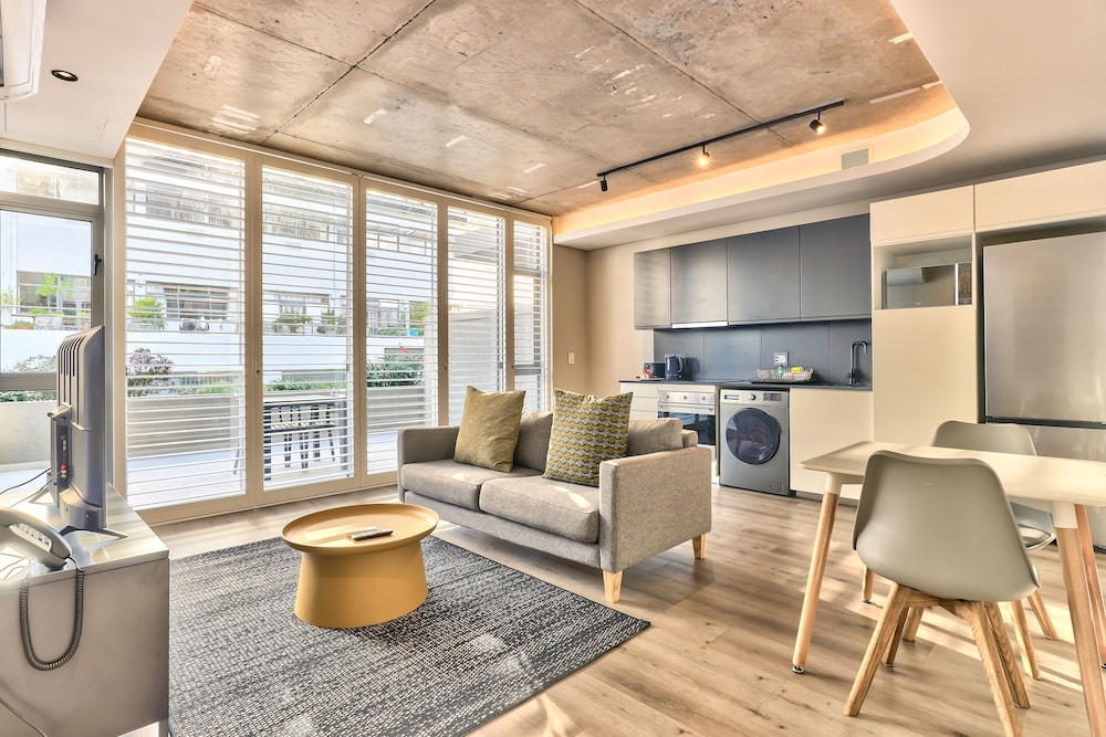 One Bedroom With Balcony and City Views