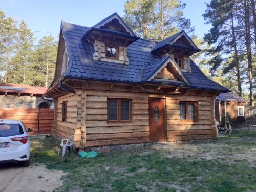 Domek Letniskowy M & E — hotel in Jedwabno