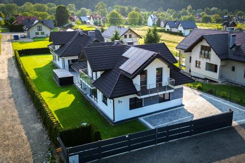Domino Apartamenty Red — 4-Star Luxury Hotel in None, Poland