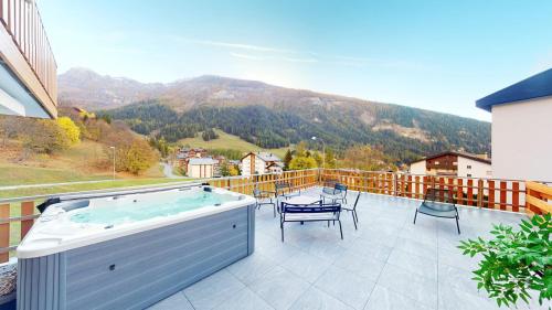 Spacious apartment beautiful terrace with view — 4-Star Luxury Hotel in Leukerbad, Switzerland