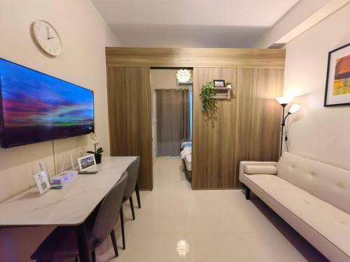 1BR Condotel with Balcony at FAME Residences #FM51 — 4-Star Luxury Hotel in Manila, Philippines