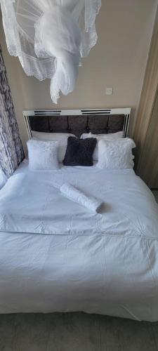 One bedroom at Tsavo fedha