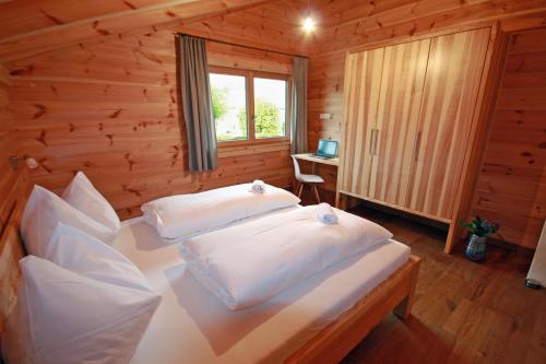 Chalet Huber by Alpenidyll Apartments — 4-Star Luxury Hotel in Aich, Austria