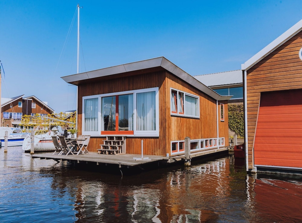 Houseboat in Netherlands with Private Dock — 4-Star Luxury Hotel in Uitgeest, Netherlands
