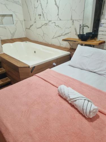 Quarto Casal Banheira in Conde, Brasil