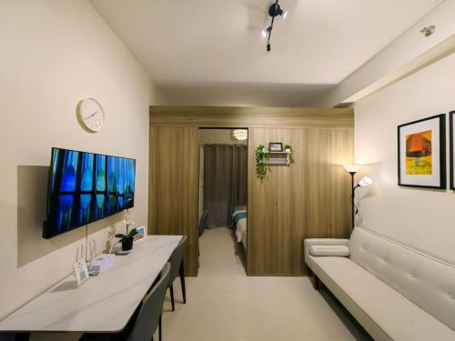 1BR Condotel with Balcony at FAME Residences #FM52 1 — 4-Star Luxury Hotel in Manila, Philippines
