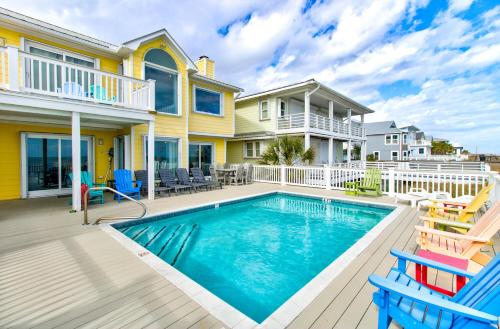 Dolphin Run by Carolina Beach Realty in Kure Beach, United States