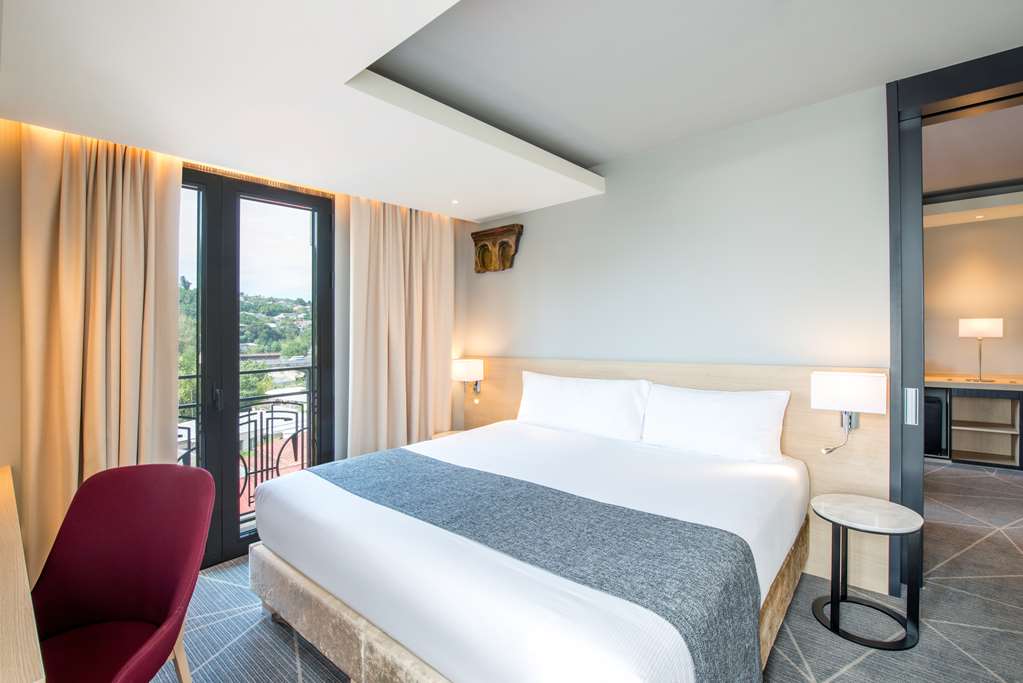 Suite Bedroom- King Bed, Mini-bar, Safe, Complimentary Wi-Fi and Breakfast