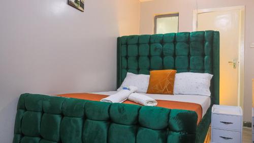 Cosy & Stylish studio apartment near JKIA SGR with high speed WiFi NETFLIX free parking and secure.