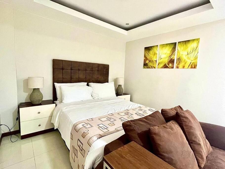 Sheryll Escapes 214 La Grande Studio comfy hotel amenities with Netflix in Angeles City, Philippines
