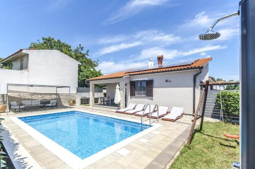 Holiday House Gortan for 7 people near Pula with children playground and private pool pet friendly — 4-Star Luxury Hotel in Marcana, Croatia