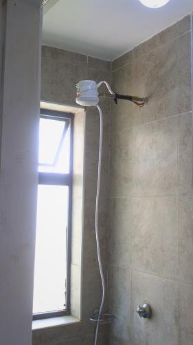 DefiniteHomes3 Fully furnished studio apartment with a rooftop restaurant near JKIA Airport SGR Terminus Downtown