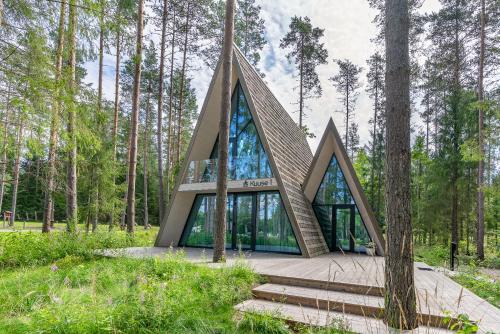 Kuuse elamusmajad in Raasiku, Estonia