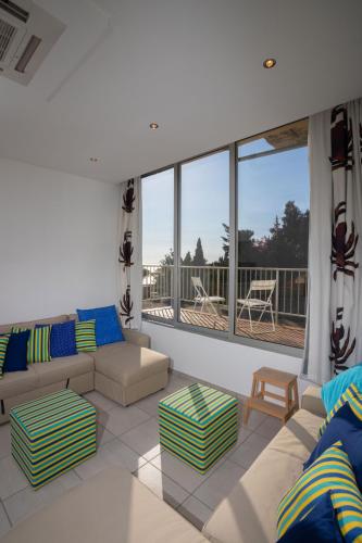 Athenaeum Beachside Apt by TrulyCyprus