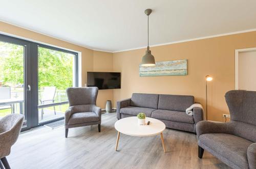 Yogasutra Stilvolles 3 Zimmer Apartment mit Seeblick Balkon & Sauna — 4-Star Luxury Hotel in Krakow Am See, Germany