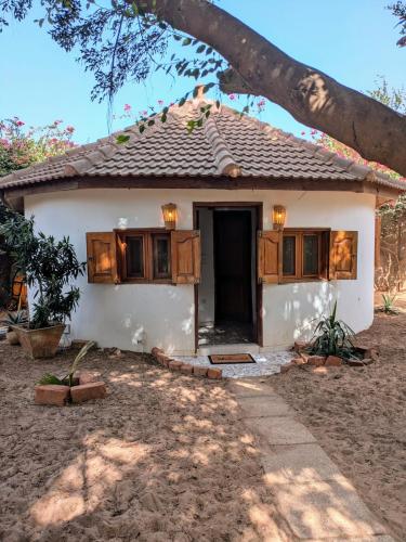 Chez Anaïs Case indépendante dans un grand jardin avec piscine in Unknown City, Senegal