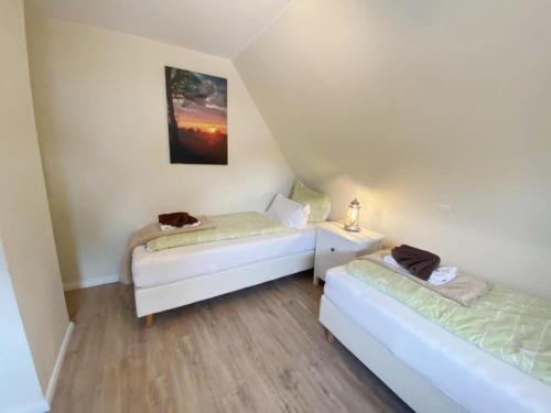 Am Oland 11 Am Oland 11 vorne — 4-Star Luxury Hotel in Busum, Germany
