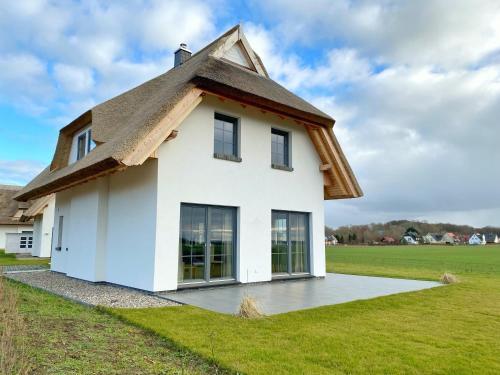 Ferienhaus Distelfink mit Sauna und Kamin in Dranske, Germany