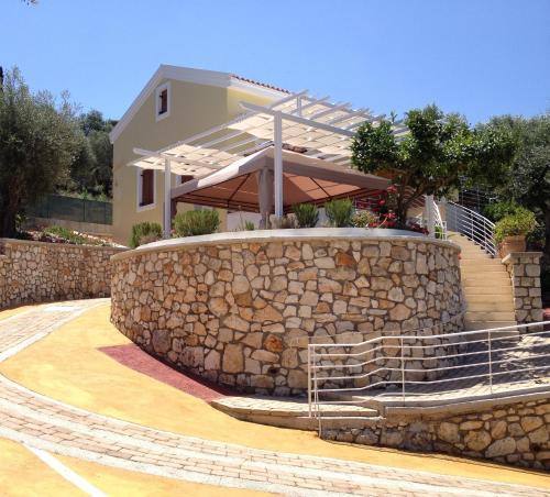 Tesoro of Ithaca — 4-Star Luxury Hotel in Stavros, Greece