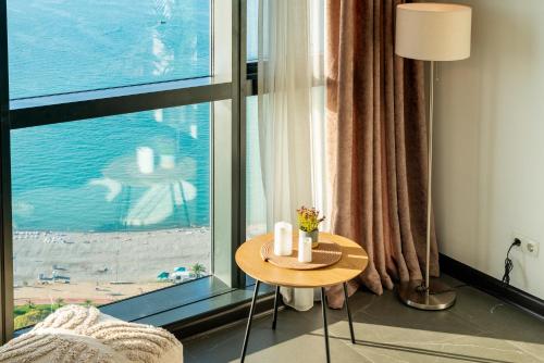 Ocean Breeze Retreat Honeymoon Apartment with Sea View in Porta Batumi Tower in Batumi, Georgia