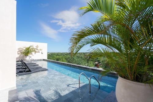 Queen Bed Suite Infinity pool & gym fast Wifi Nespresso & Netflix — 4-Star Luxury Hotel in Tulum, Mexico