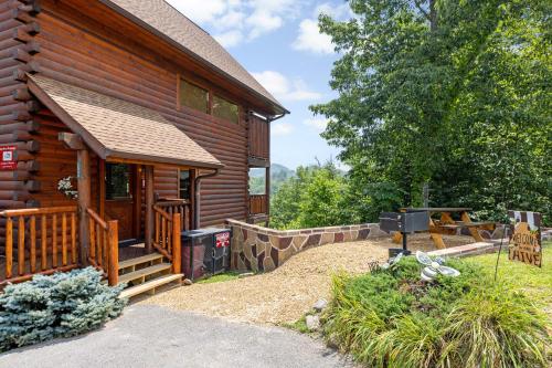 A Taste Of Honey is a dog friendly two bedroom true log cabin nestled inside the Starr Crest resort — 4-Star Luxury Hotel in Sevierville, United States