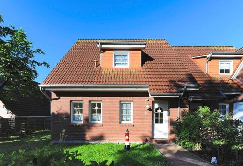 Ferienhaus Strandkorb - carbon neutral hotel in Esens