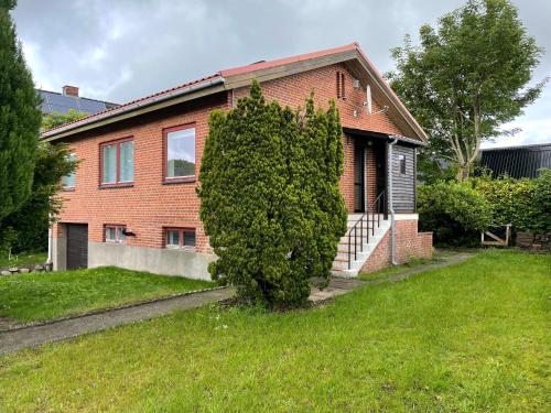 Rødt hus - carbon neutral hotel in Unknown City