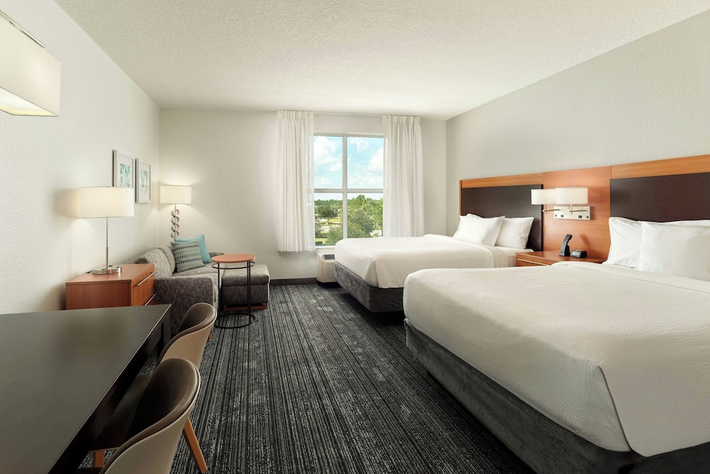 TownePlace Suites Orlando at FLAMINGO CROSSINGS Town Center Western Entrance - photo 13