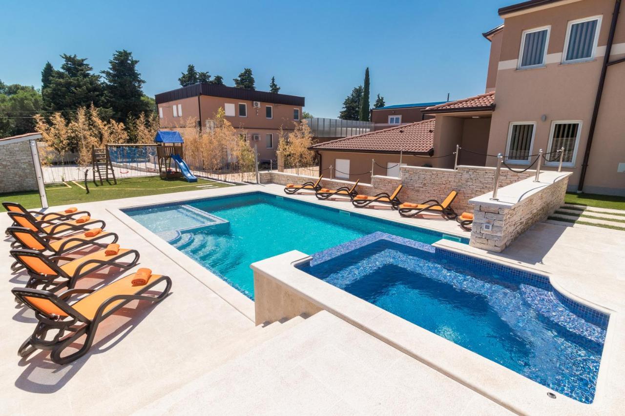 Superb Villa Maxima with Private Pool Sauna Jacuzzi Playground for Up To 18 Persons Extra Pool Heating Available — Marcana — photo 4