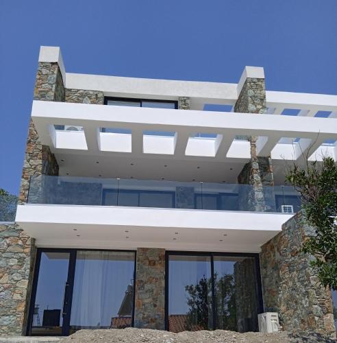 Plomari View Stone Apartments — 4-Star Luxury Hotel in Plomari, Greece
