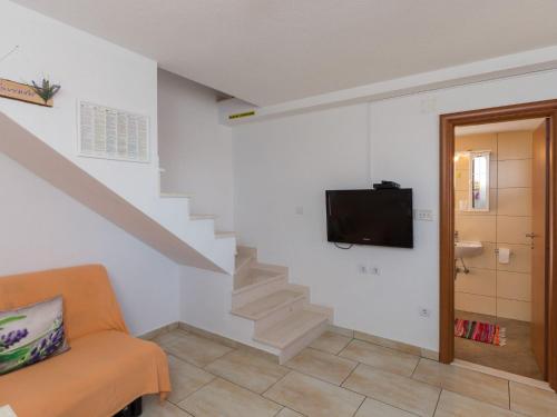Apartments Lovro Duplex One Bedroom Apartment with Terrace and Partial Sea View 1