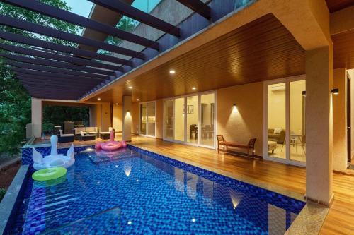 Inara by StayVista Amidst lush greenery with Outdoor swimming pool & Indoor games in Lonavla, India