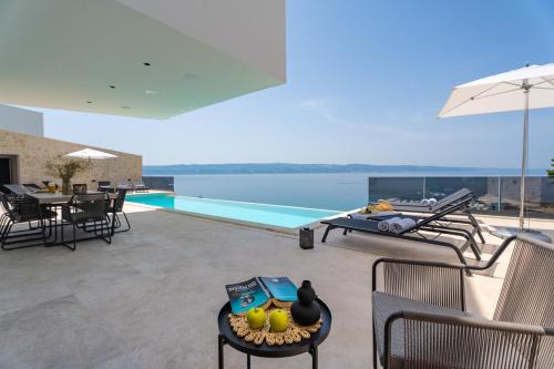 Seafront Villa Kiara with 5 en suite bedrooms in Omiš — 4-Star Luxury Hotel in Omis, Croatia