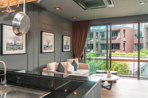 Luxury King Bed Apartment with Pool View and Sauna Spacious 57 sqm — 4-Star Luxury Hotel in Rawai, Thailand