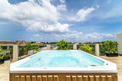 2 BD Suite with Balcony Gym Rooftop Pool Hot Tub — 4-Star Luxury Hotel in Playa Del Carmen, Mexico