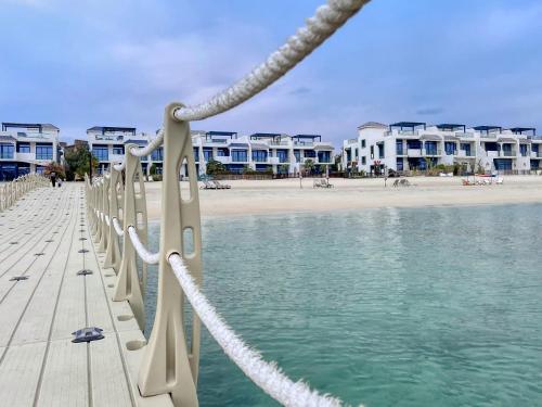 Luxury Palm Villa with Beach Access Rooftop Garden & Resort Style Pool by Exclusive Holiday Homes