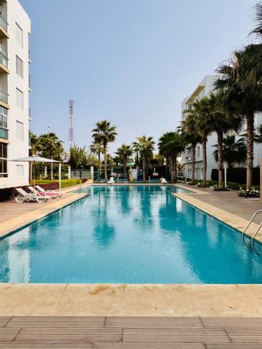 Bright Apt with Balcony WiFi Parking and Pool Resort in Bouznika, Morocco