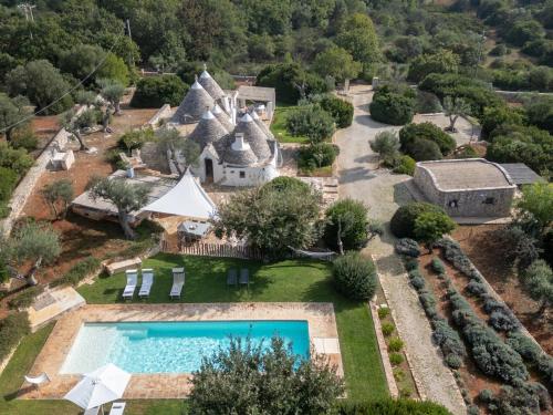 Trullo Luna 6&1 Emma Villas — 4-Star Luxury Hotel in Ostuni, Italy