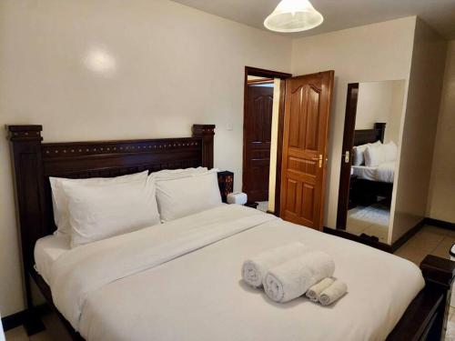 Serenity Retreat 2 Bed Apartment with Pool & Gym
