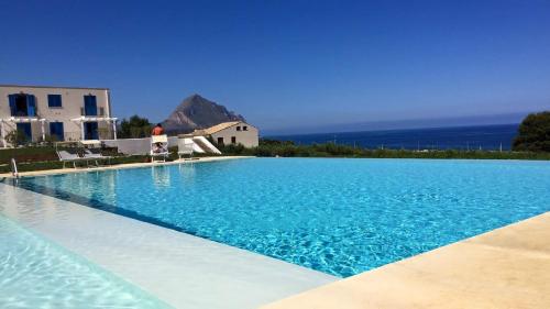 Central Apartment Macari Cala Azzurra Residence — 4-Star Luxury Hotel in San Vito Lo Capo, Italy