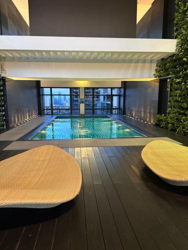 Homestyle Studio with City View in Gramercy Residences Condo — 4-Star Luxury Hotel in Manila, Philippines