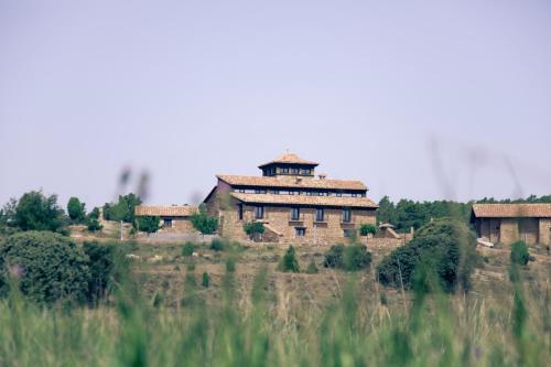 Hotel Restaurante Masía la Torre - carbon neutral hotel in Mora De Rubielos